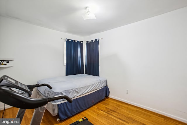 bedroom featuring hardwood / wood-style floors