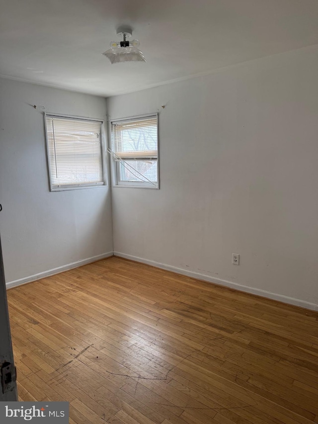 unfurnished room featuring light wood-type flooring