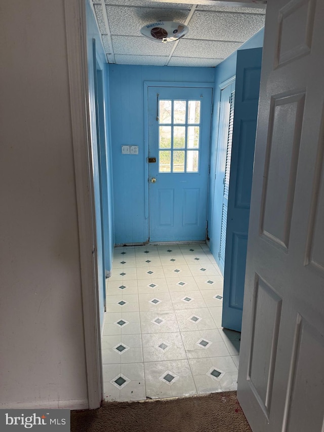 entryway with light tile patterned floors