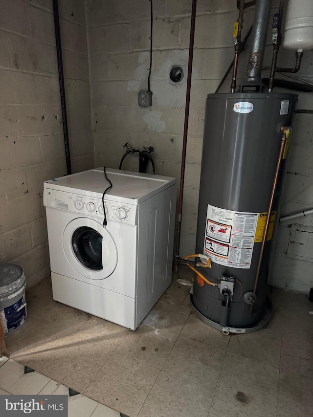 laundry area featuring washer / clothes dryer and gas water heater