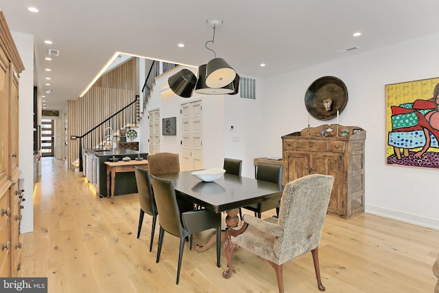 dining room featuring light wood-type flooring