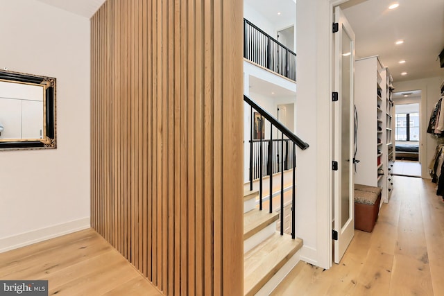 stairs with wood-type flooring