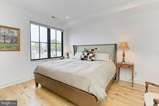 bedroom featuring light wood-type flooring