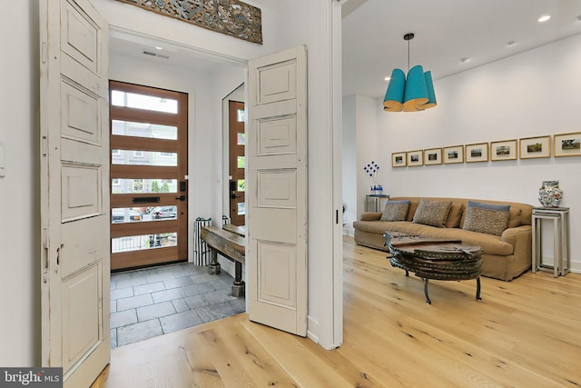 entryway with light wood-type flooring