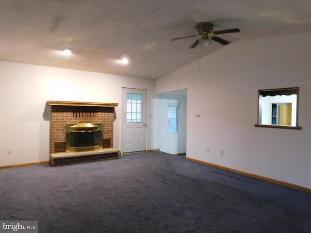 unfurnished living room with a brick fireplace, carpet, ceiling fan, and vaulted ceiling