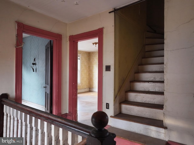 staircase with plenty of natural light