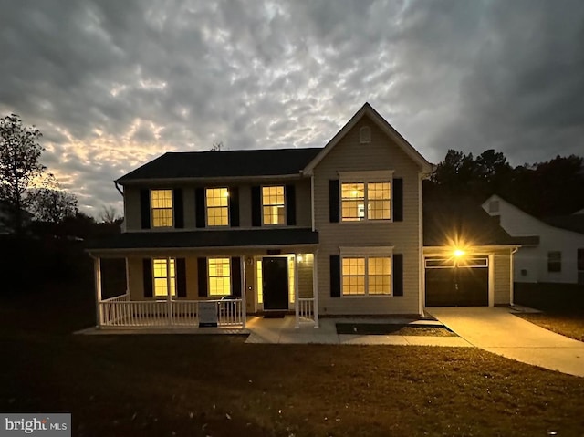 rear view of property with covered porch