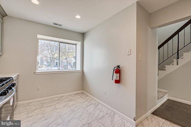 interior space featuring stainless steel gas stove