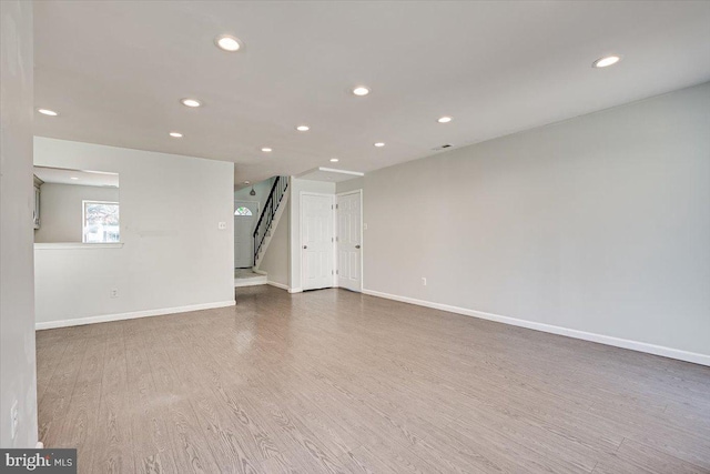 spare room featuring hardwood / wood-style flooring