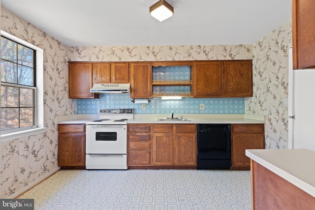 kitchen with white appliances, a healthy amount of sunlight, and sink