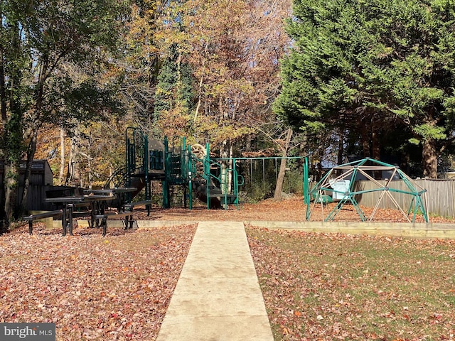 view of property's community featuring a playground