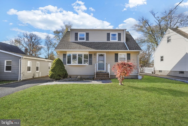 view of front of property with a front lawn