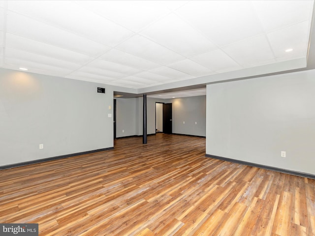 spare room with light hardwood / wood-style flooring