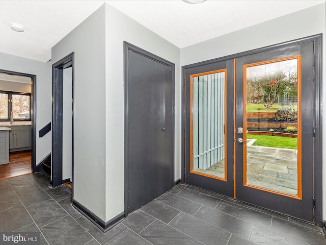 entryway featuring french doors