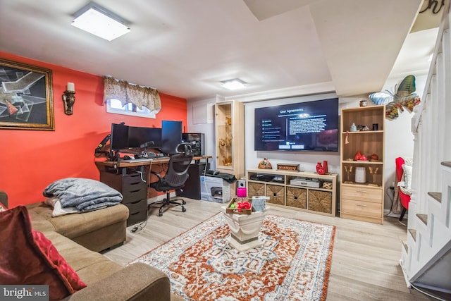 office with light wood-type flooring