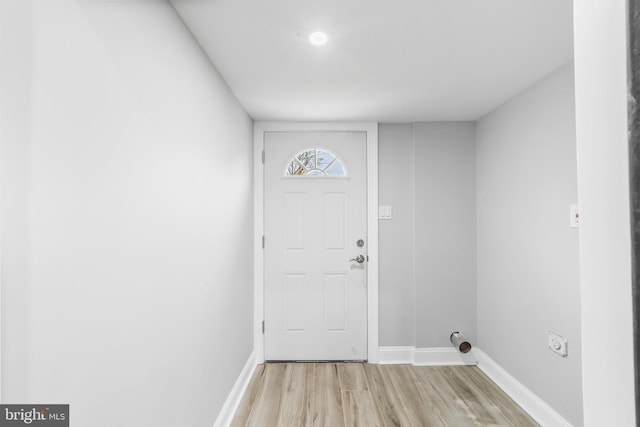 doorway with light hardwood / wood-style flooring