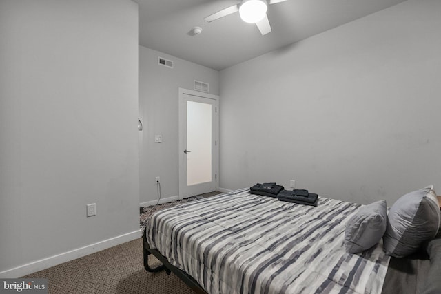 bedroom with ceiling fan and carpet floors