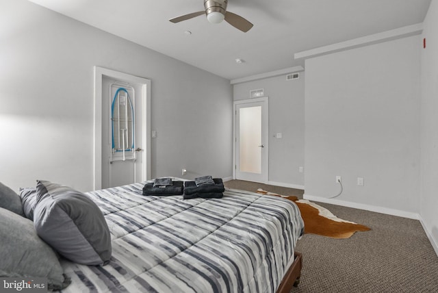 carpeted bedroom featuring ceiling fan