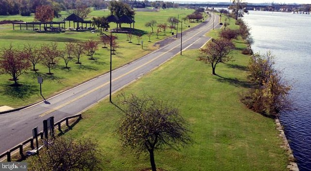 bird's eye view with a water view and a rural view