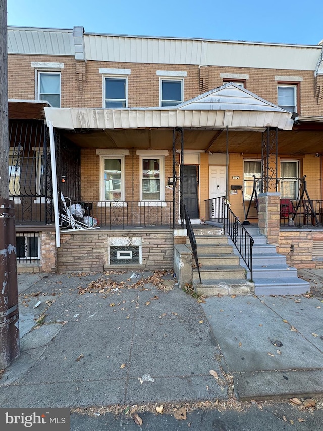 multi unit property featuring covered porch