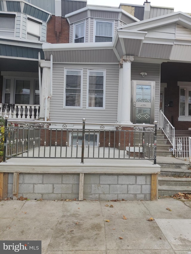 doorway to property with a porch