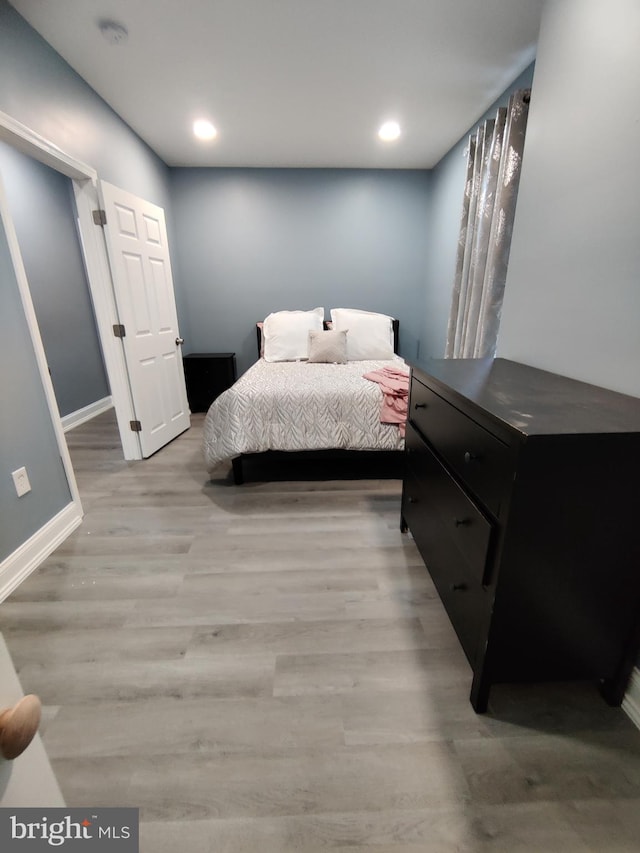 bedroom featuring light hardwood / wood-style flooring