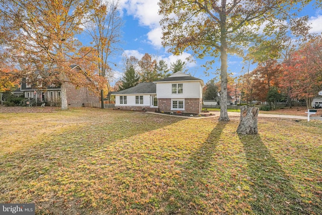 view of front of home with a front lawn