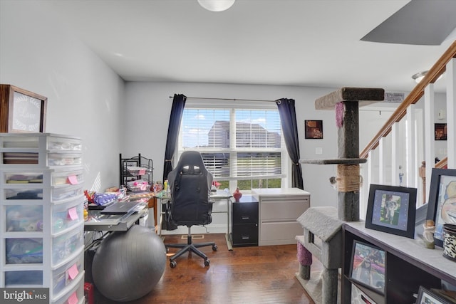 office with dark hardwood / wood-style flooring