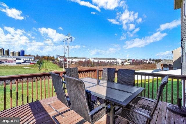 deck featuring a lawn