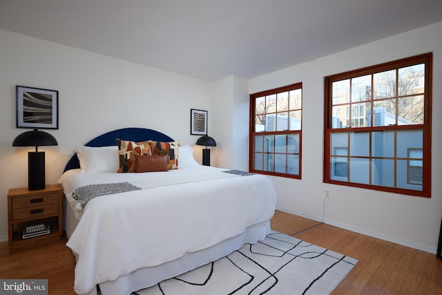 bedroom featuring hardwood / wood-style flooring