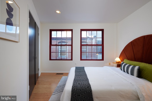 bedroom featuring light hardwood / wood-style floors