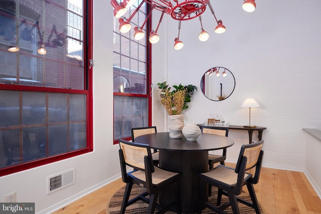 dining space featuring hardwood / wood-style flooring