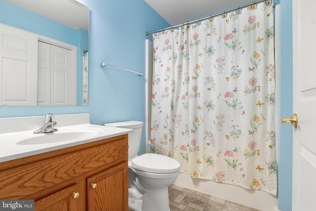 357 Winners Cir, Red Lion, PA 17356 - bathroom featuring vanity, toilet, and shower / tub combo with curtain
