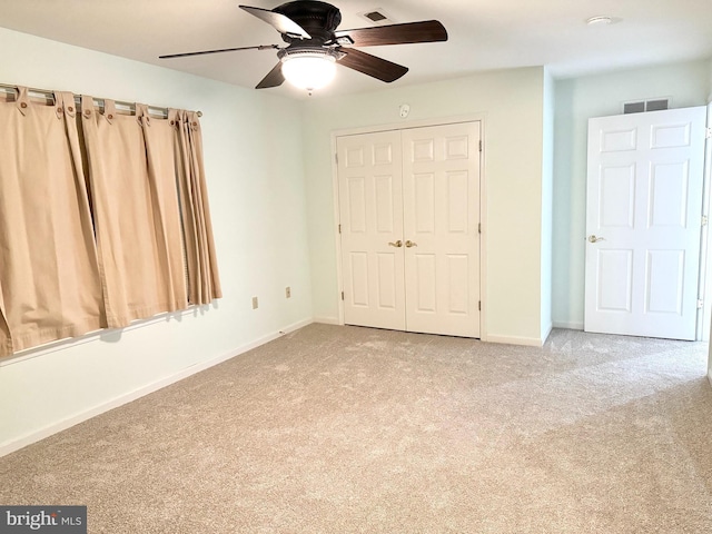 357 Winners Cir, Red Lion, PA 17356 - unfurnished bedroom featuring carpet flooring, a closet, baseboards, and a ceiling fan