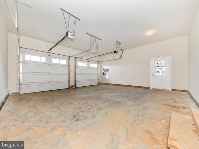 garage featuring a garage door opener