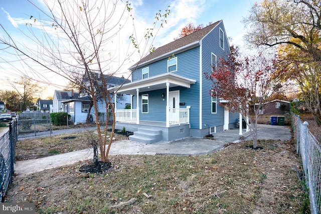 view of property with covered porch