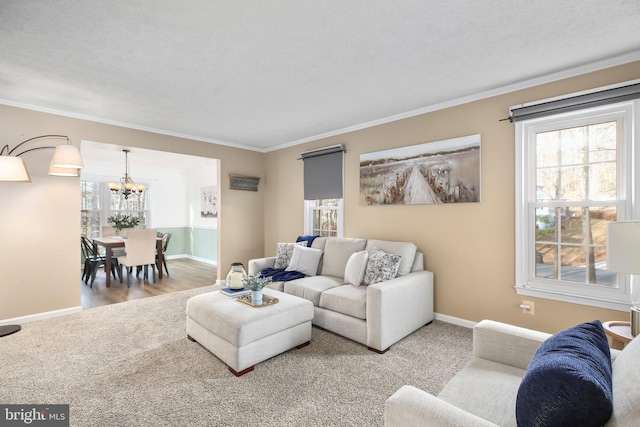 living room with a wealth of natural light, baseboards, and ornamental molding