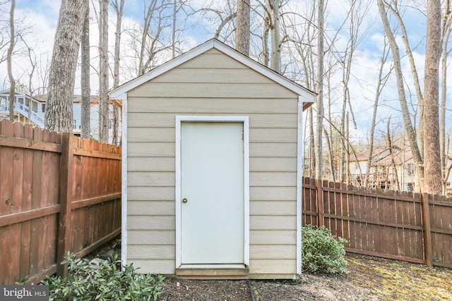 view of shed featuring a fenced backyard