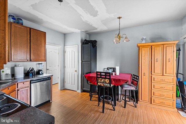 kitchen featuring hanging light fixtures, light hardwood / wood-style floors, a notable chandelier, and stainless steel dishwasher