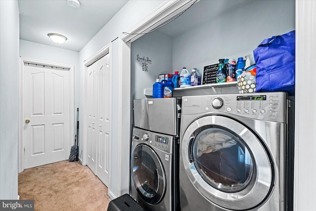 laundry room featuring carpet floors and independent washer and dryer