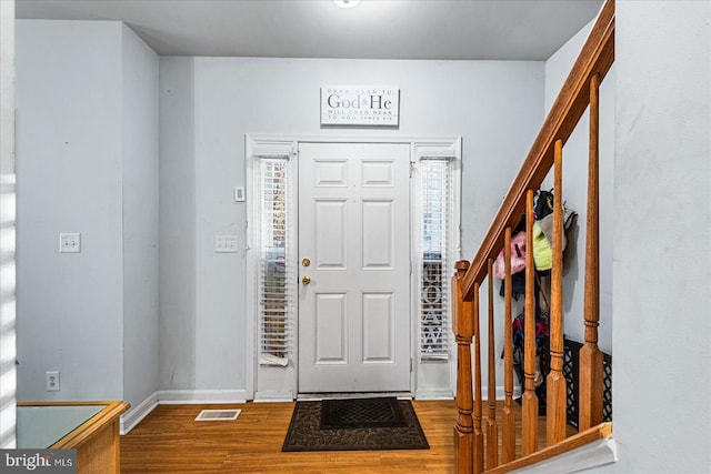 foyer with hardwood / wood-style flooring