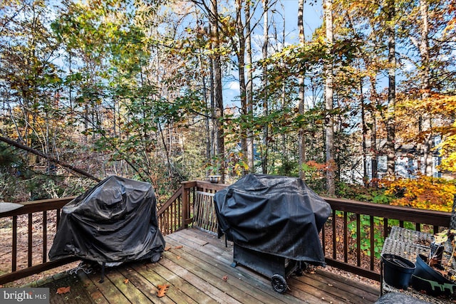 wooden deck with area for grilling