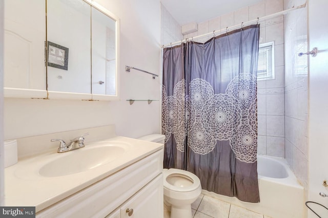 full bathroom with tile patterned flooring, vanity, toilet, and shower / tub combo