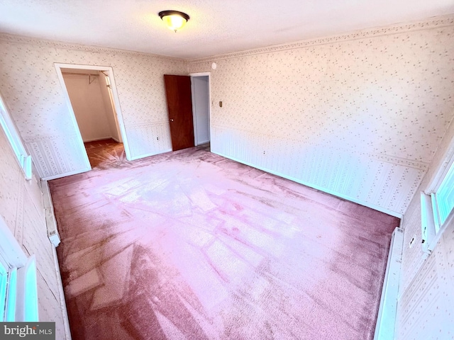 unfurnished room with light colored carpet