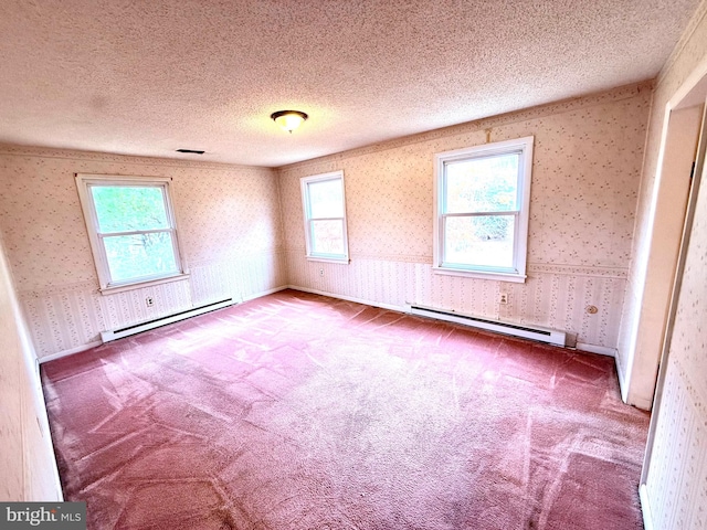 carpeted empty room featuring a textured ceiling and a baseboard radiator