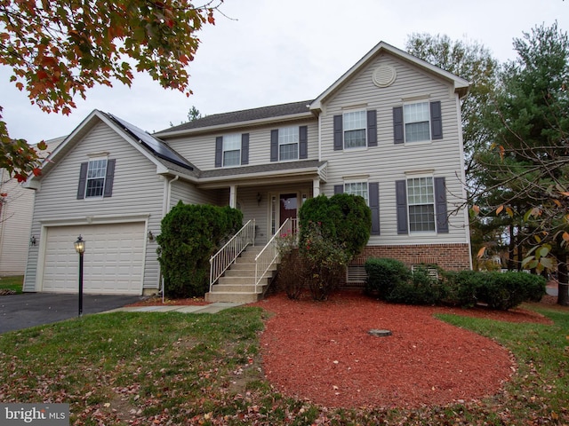 view of front property featuring a garage