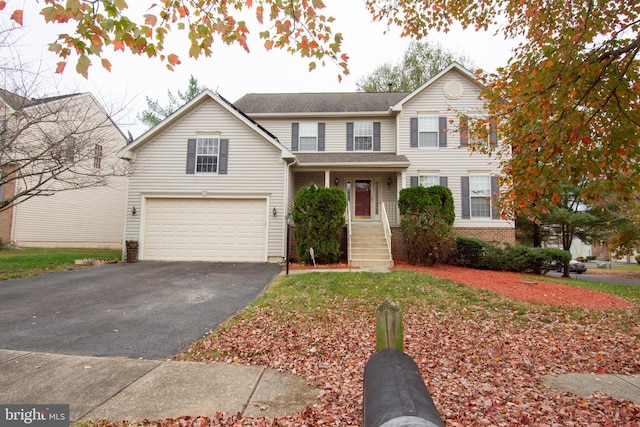 view of front property with a garage