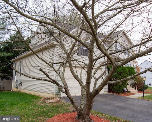 view of home's exterior with a garage