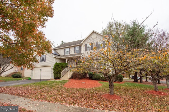 view of property featuring a garage