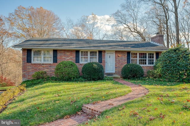 single story home with a front yard